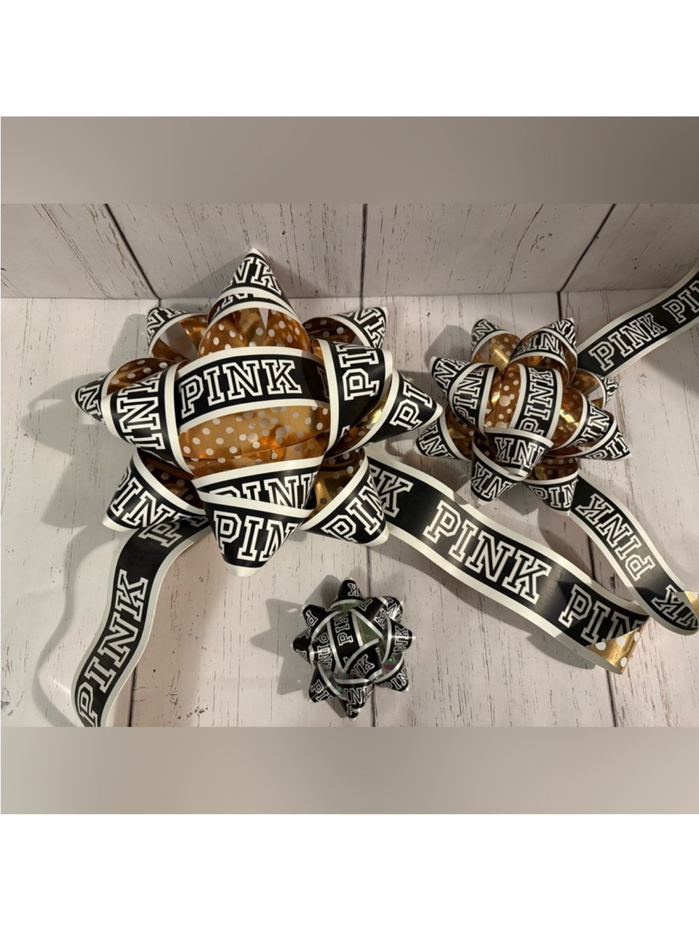 Black and Gold Branded display / prop bows